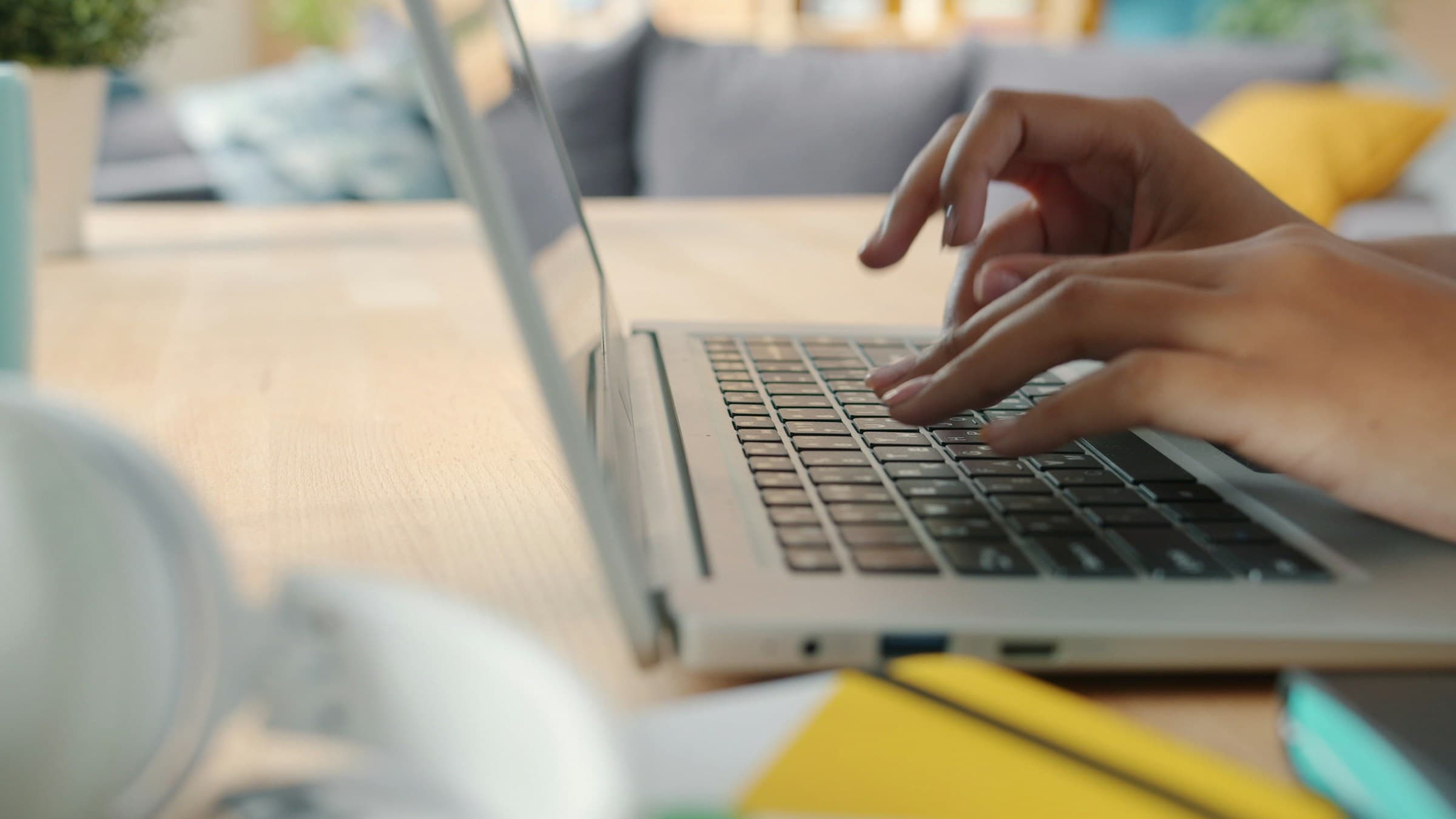 Clinician at work on a laptop